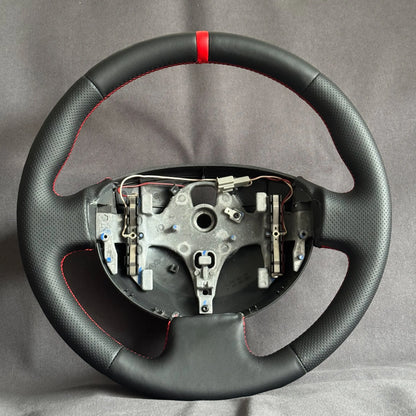 Volant Renault Megane 2 RS cuir et cuir perforé - surpiqûres rouges et centreur rouge STL Performance