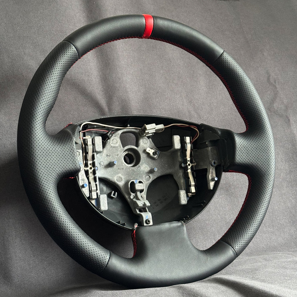 Volant Renault Megane 2 RS cuir et cuir perforé - surpiqûres rouges et centreur rouge