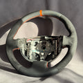 Volant Renault Megane 2 RS alcantara et cuir perforé - surpiqûres orange et centreur orange